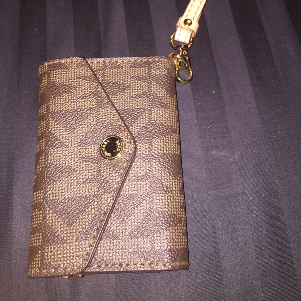 Michael Kors tiny wristlet for your credit cards